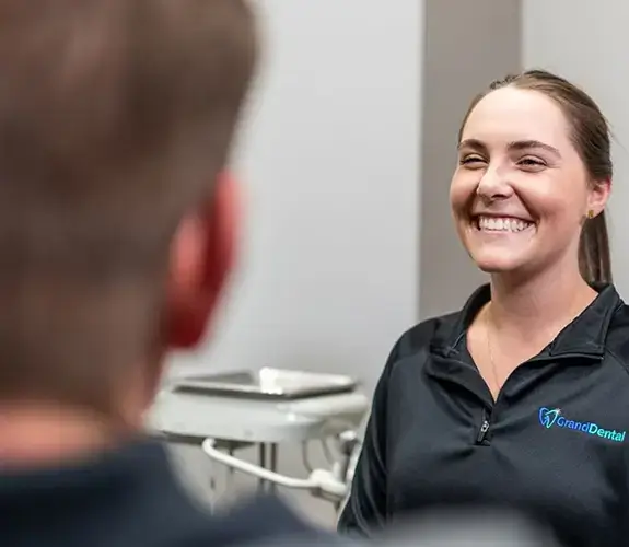 Man with glasses looking at tablet
