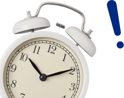 Alarm clock and exclamation mark