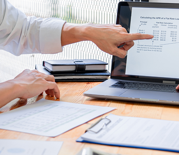 Pointing to form on a laptop monitor