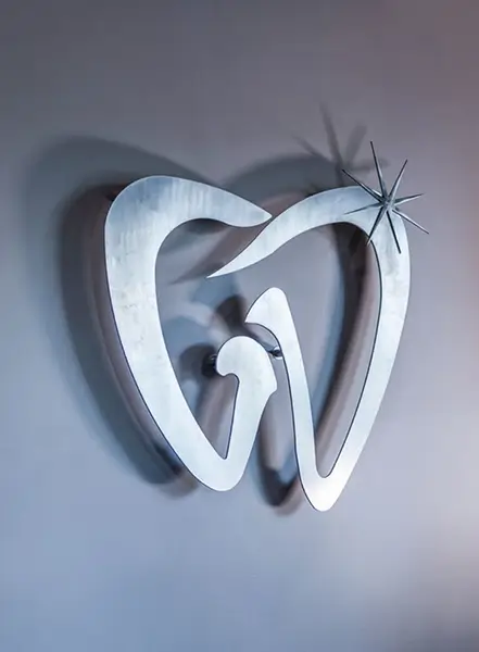 Chairs and decorative table in dental office waiting room