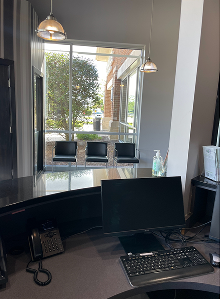 At desk with laptop facing out window