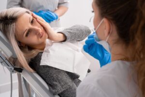 Young woman at the emergency dentist